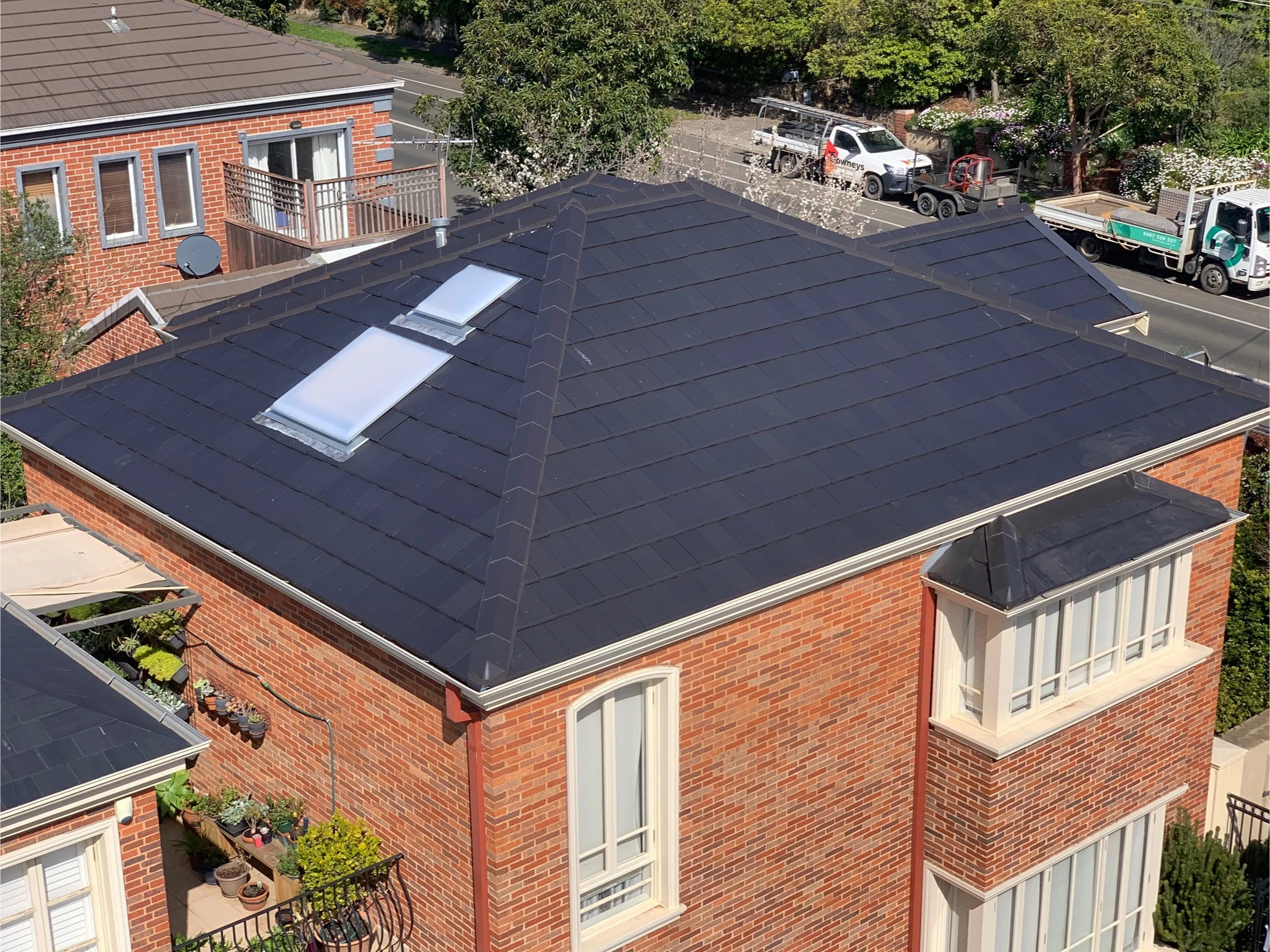 Two story townhouse with tile roofs. Frequently asked questions